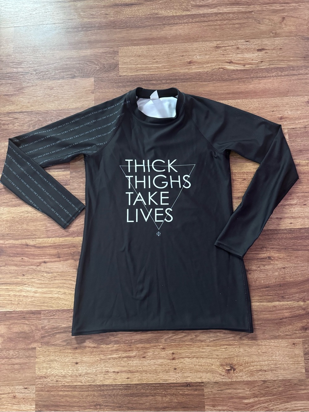Thick Thighs Take Lives Rash Guard